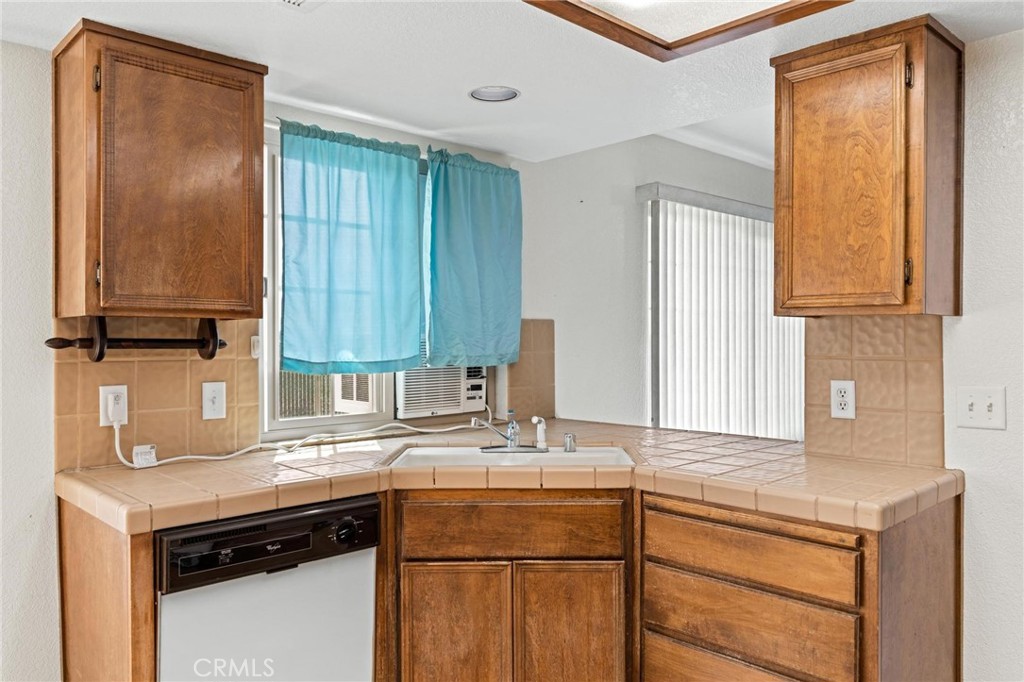 3345 Ave Two Atwater, CA 95301 - Photo 17 of 50 a kitchen with a sink cabinets and a window