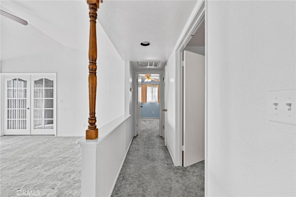 3345 Ave Two Atwater, CA 95301 - Photo 19 of 50 a view of hallway with wooden floor and cabinet