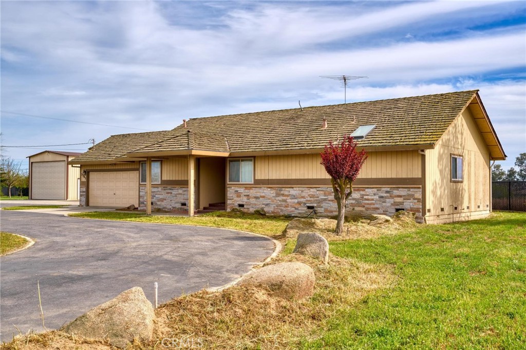 3345 Ave Two Atwater, CA 95301 - Photo 3 of 50 a front view of a house with a yard and garage