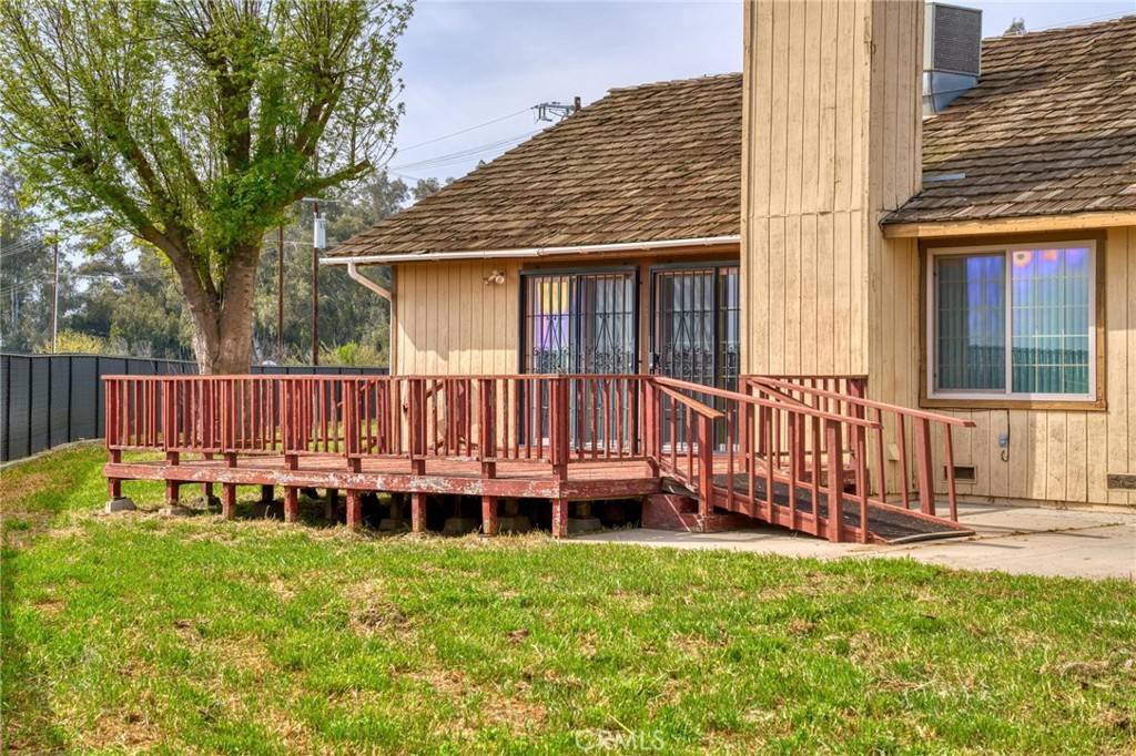 3345 Ave Two Atwater, CA 95301 - Photo 31 of 50 a view of a house with a backyard and wooden fence