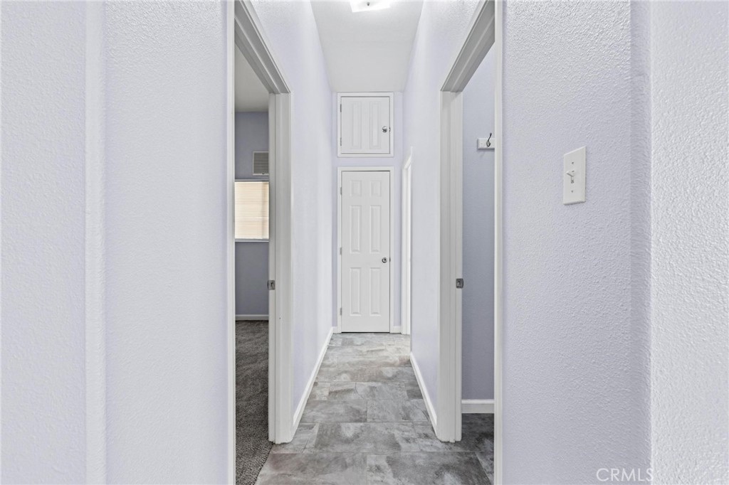 3345 Ave Two Atwater, CA 95301 - Photo 39 of 50 a view of a hallway with white doors