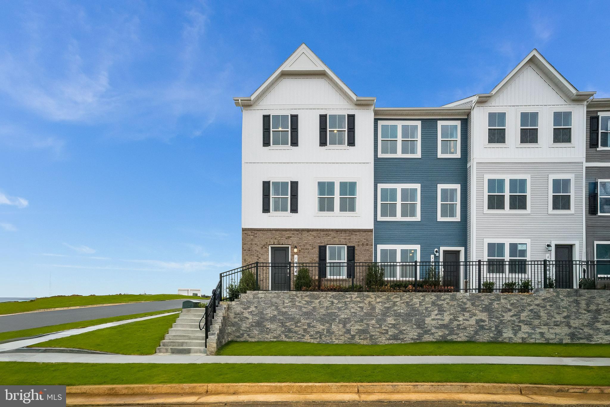 1266 Red Clover Lane Ranson, WV 25438 - Photo 1 of 24 a front view of a house with a yard