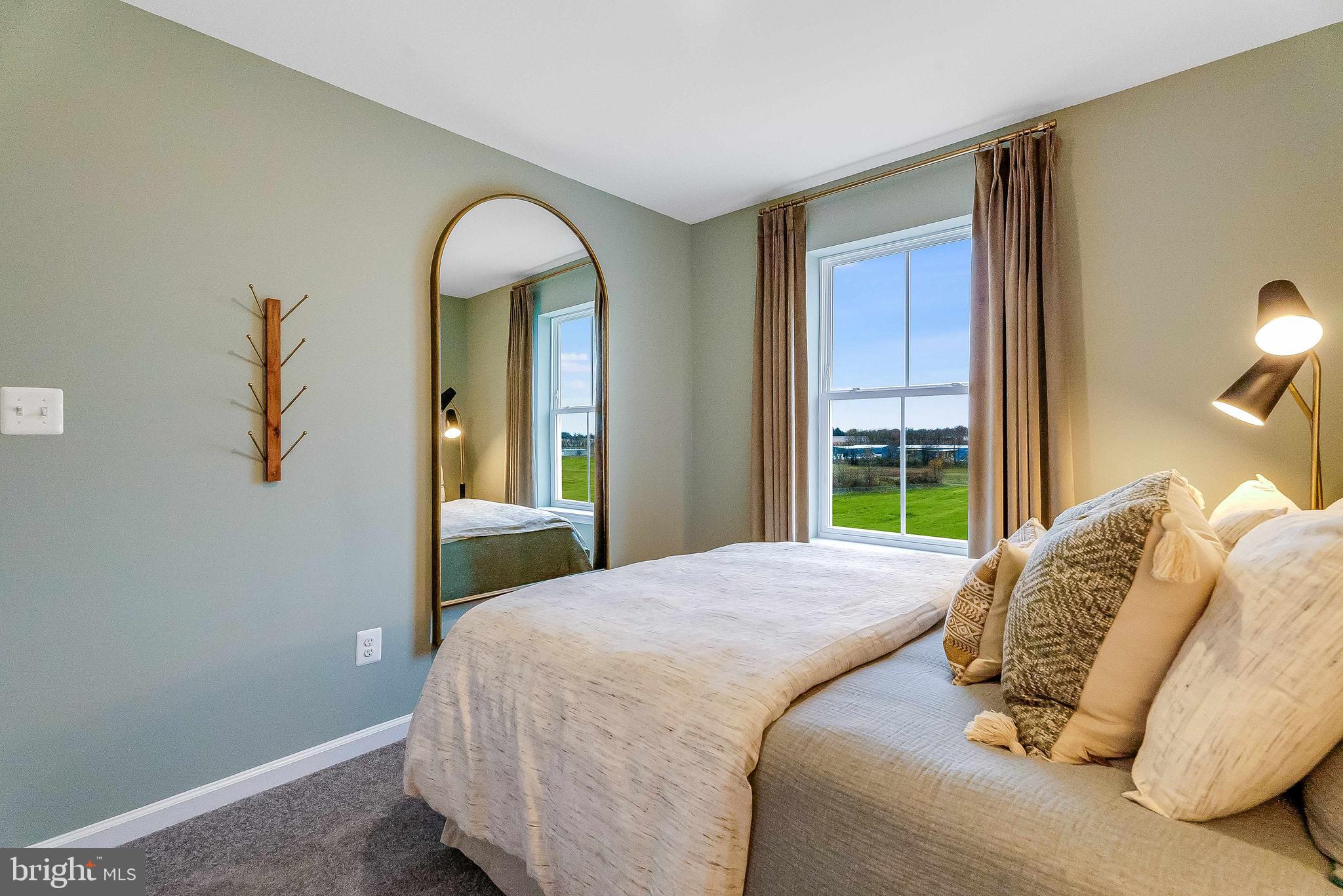 1266 Red Clover Lane Ranson, WV 25438 - Photo 21 of 24 a bedroom with a bed and a window