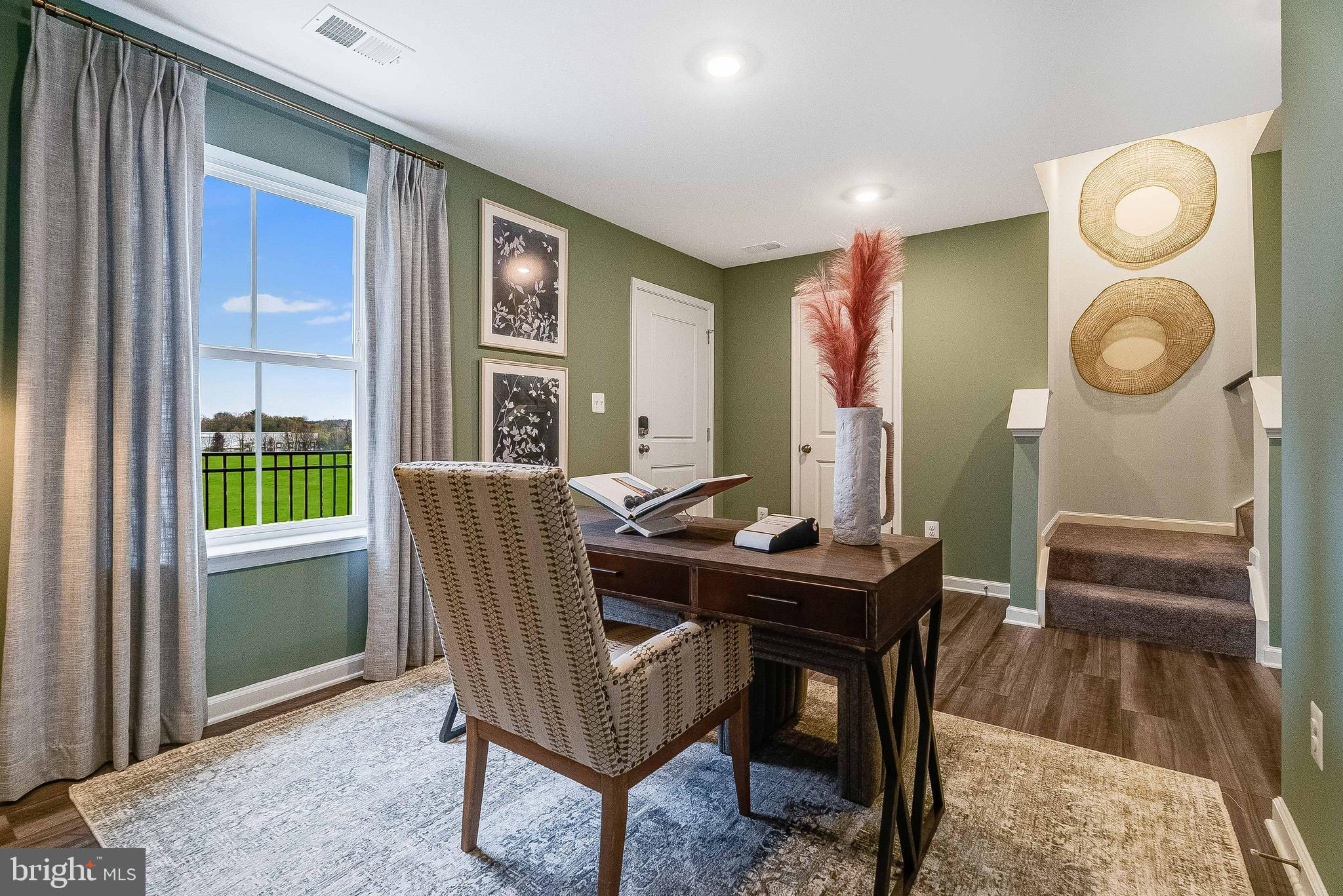 1266 Red Clover Lane Ranson, WV 25438 - Photo 4 of 24 a view of a livingroom with furniture and window