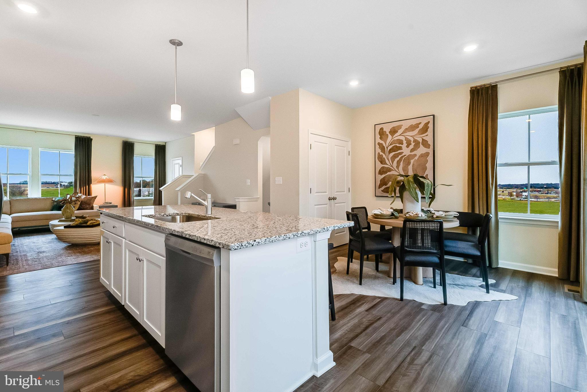 1266 Red Clover Lane Ranson, WV 25438 - Photo 6 of 24 a kitchen with sink and view of living room
