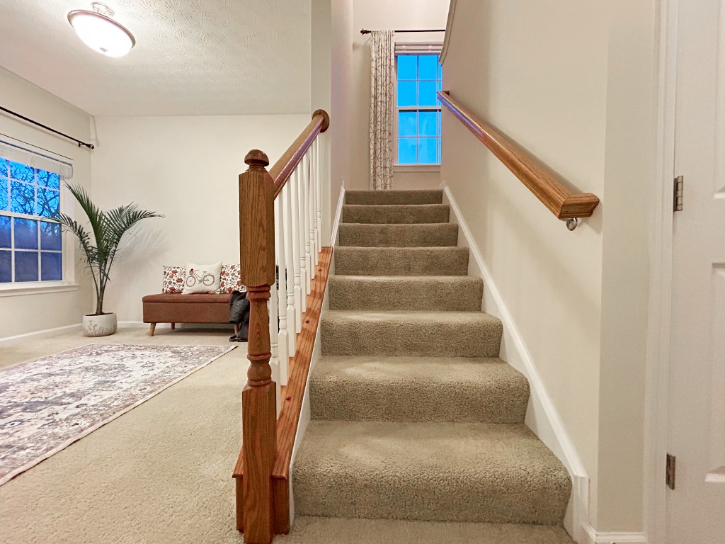 1978 Spring Ridge Drive Xenia, OH 45385 - Photo 19 of 44 This inviting interior features a grand staircase and abundant natural light.