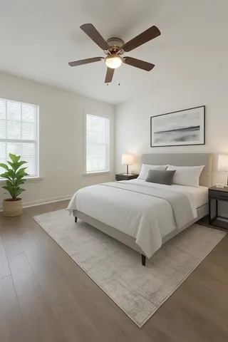 a bedroom with a bed and window