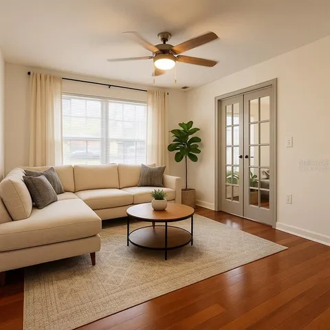 a living room with furniture and window