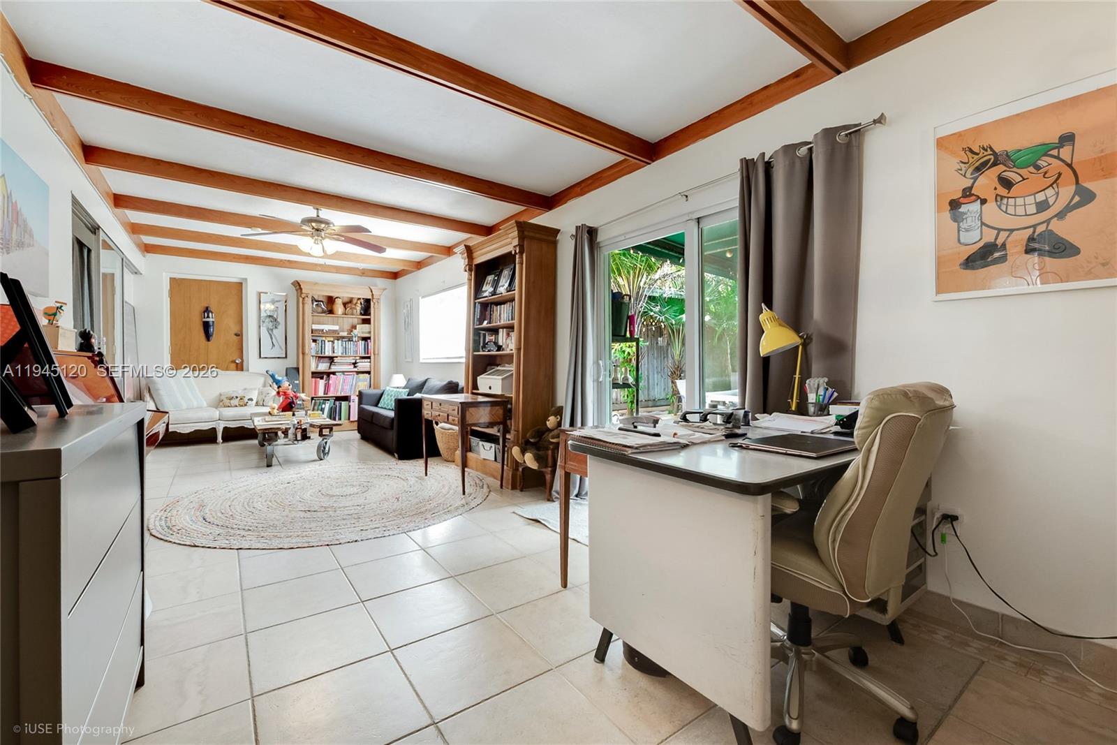 5700 Southwest 45th Terrace Miami, FL 33155 - Photo 6 of 15 a view of a livingroom with furniture and window
