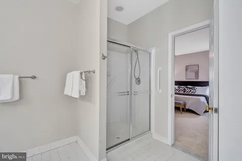 a view of an empty room and closet area