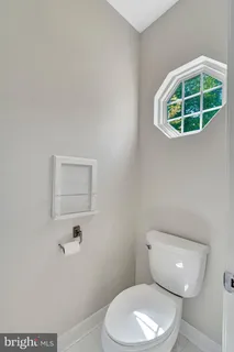 a view of entryway with livingroom and wooden floor