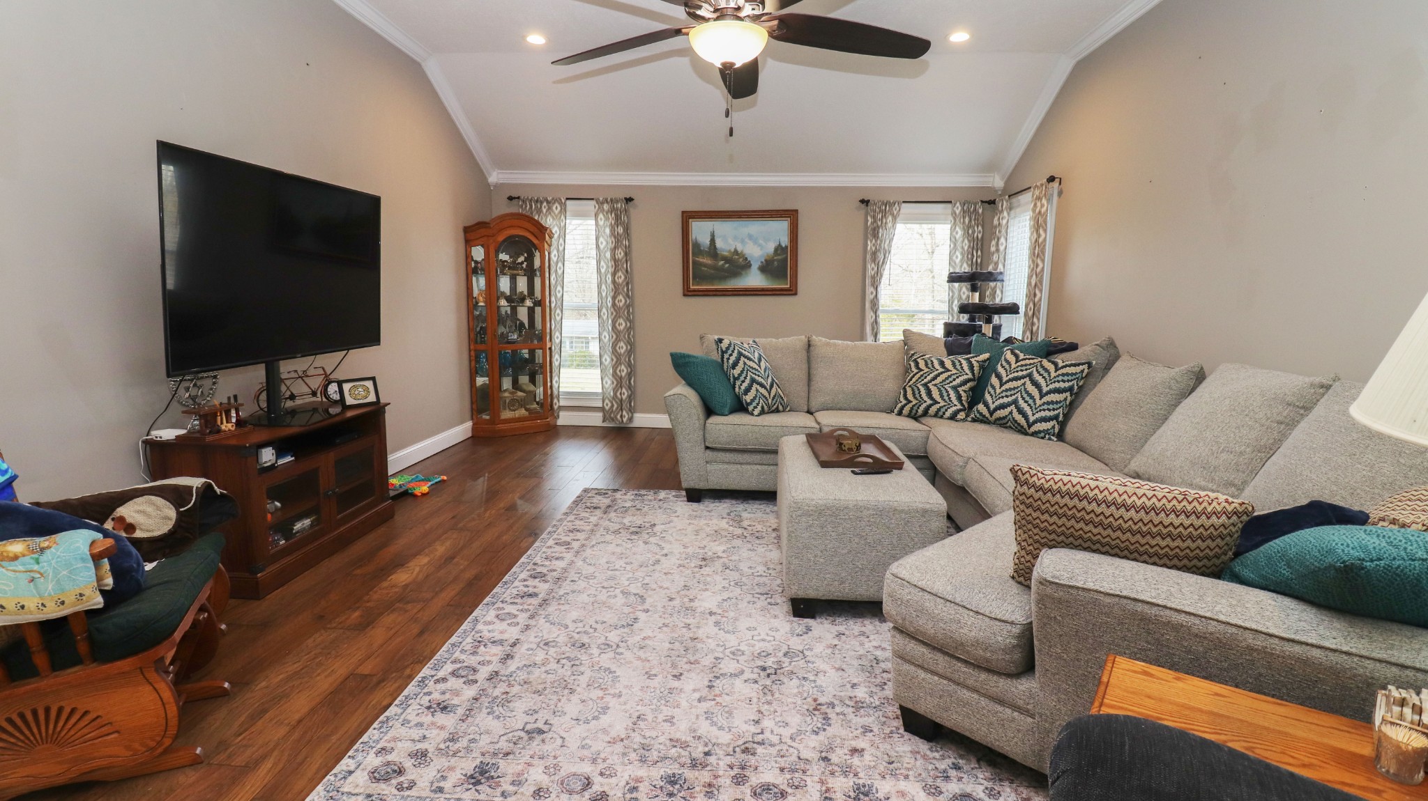 182 Lohrig Road Jackson, TN 38301 - Photo 12 of 25 a living room with furniture and a flat screen tv