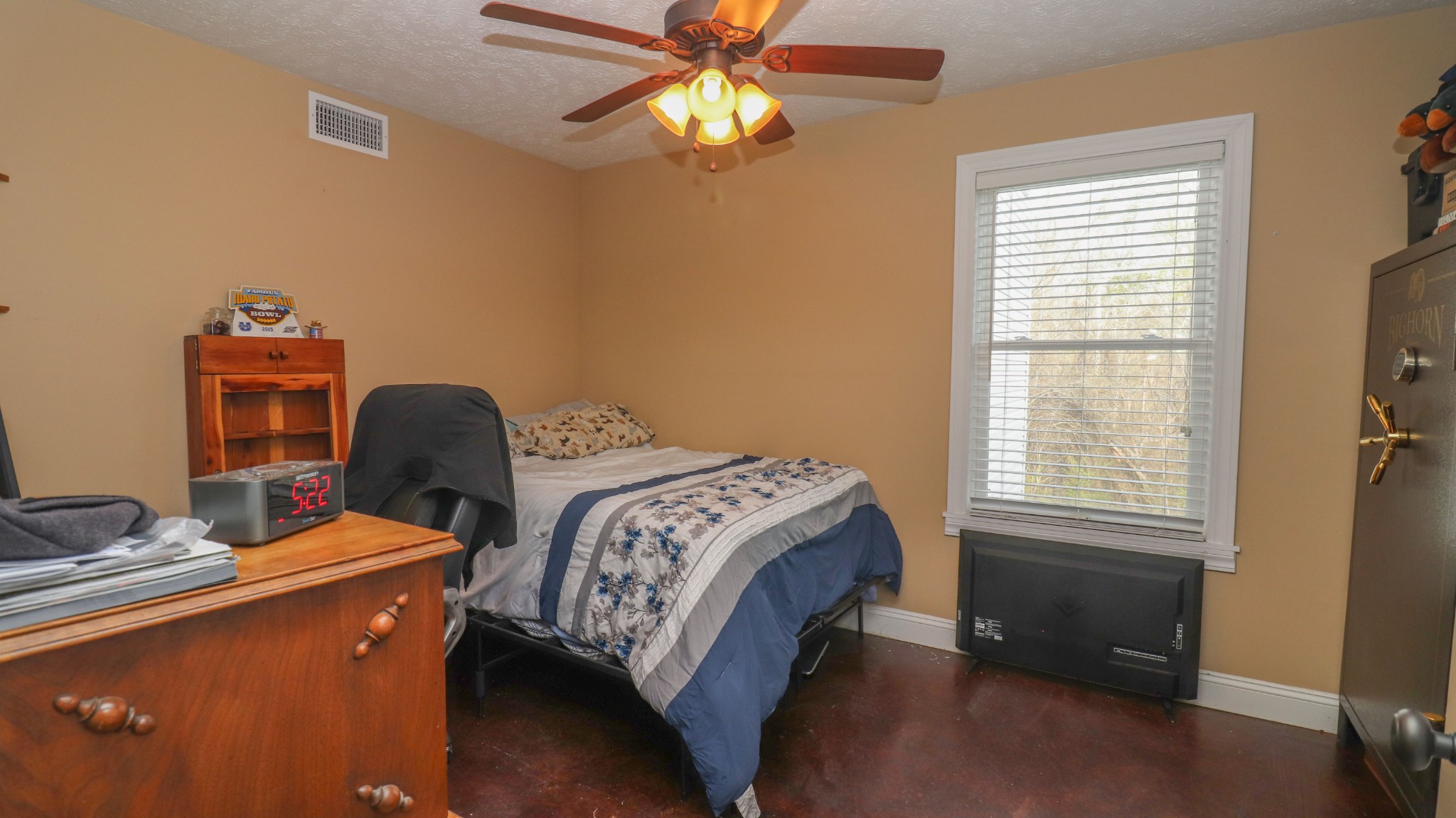 182 Lohrig Road Jackson, TN 38301 - Photo 19 of 25 a bedroom with bed and a window