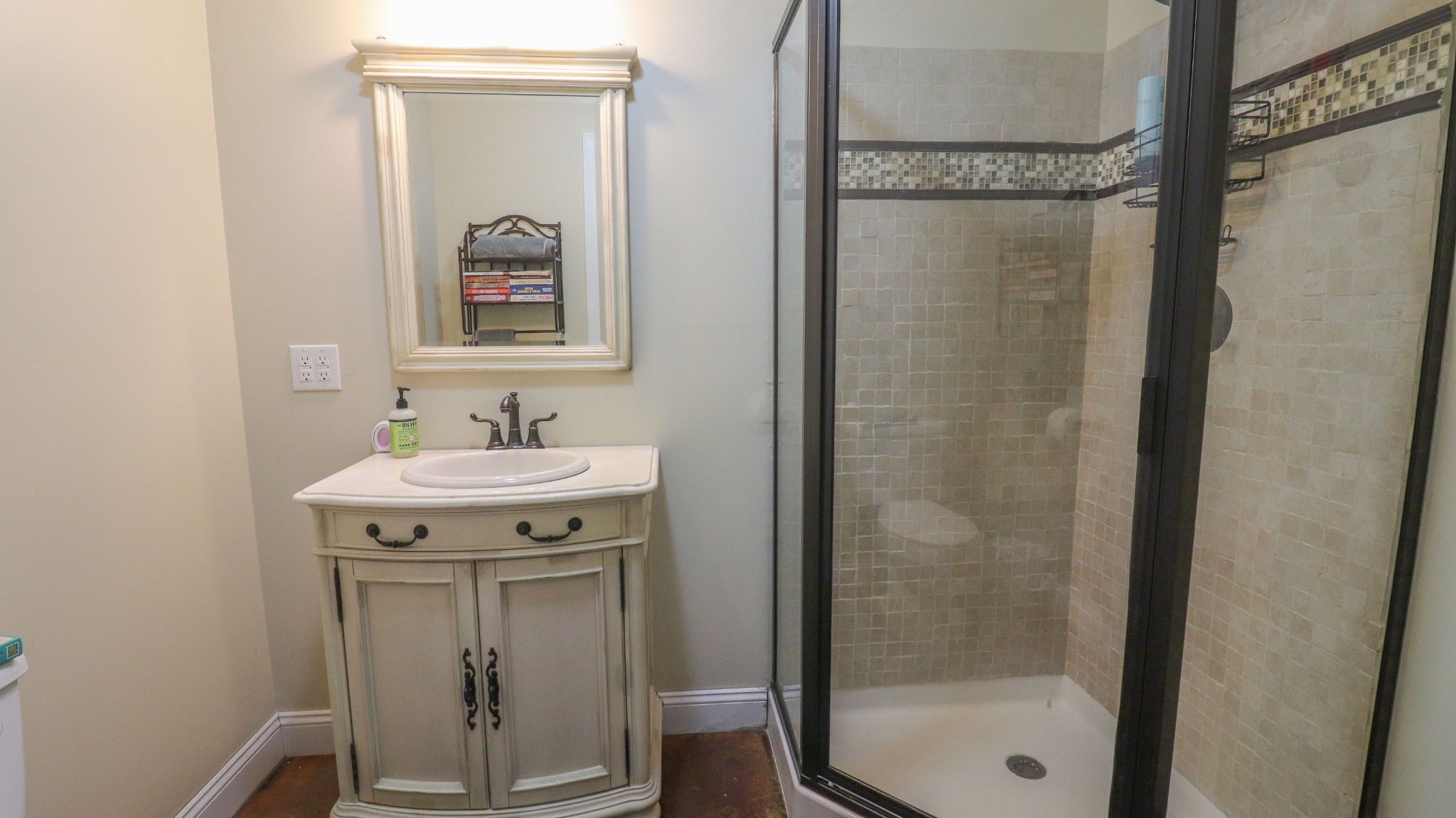 182 Lohrig Road Jackson, TN 38301 - Photo 20 of 25 a bathroom with a shower sink and mirror