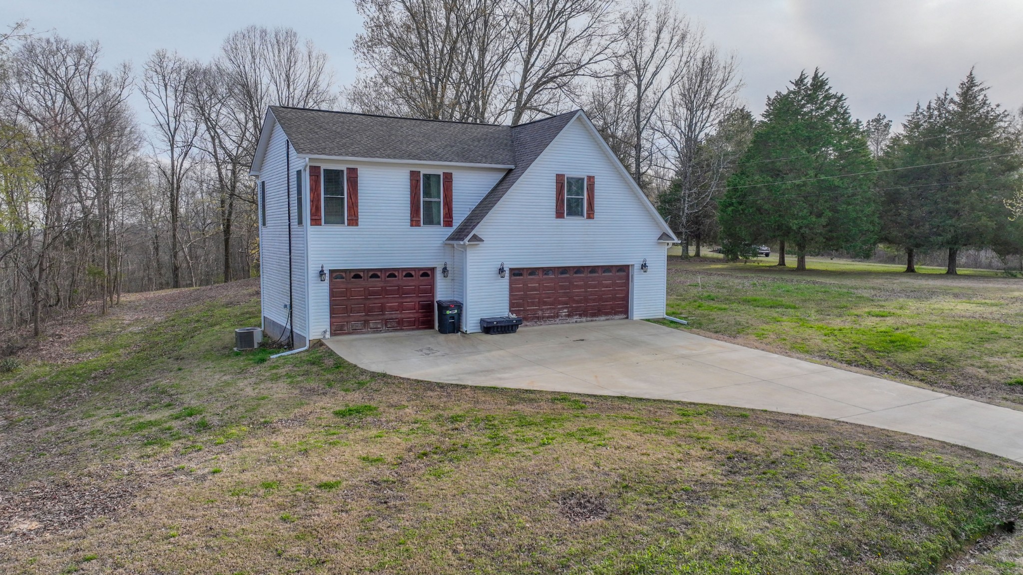 182 Lohrig Road Jackson, TN 38301 - Photo 2 of 25 a view of a yard in front of a house with large trees