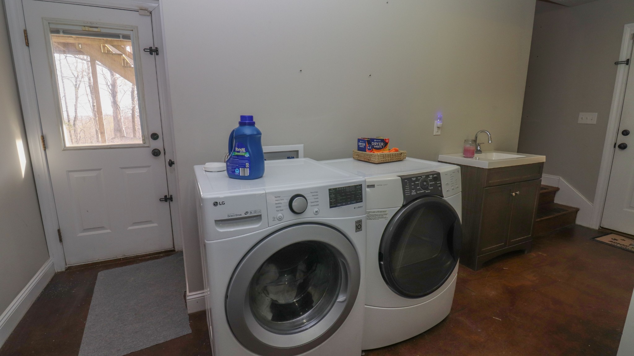 182 Lohrig Road Jackson, TN 38301 - Photo 21 of 25 a utility room with dryer and washer