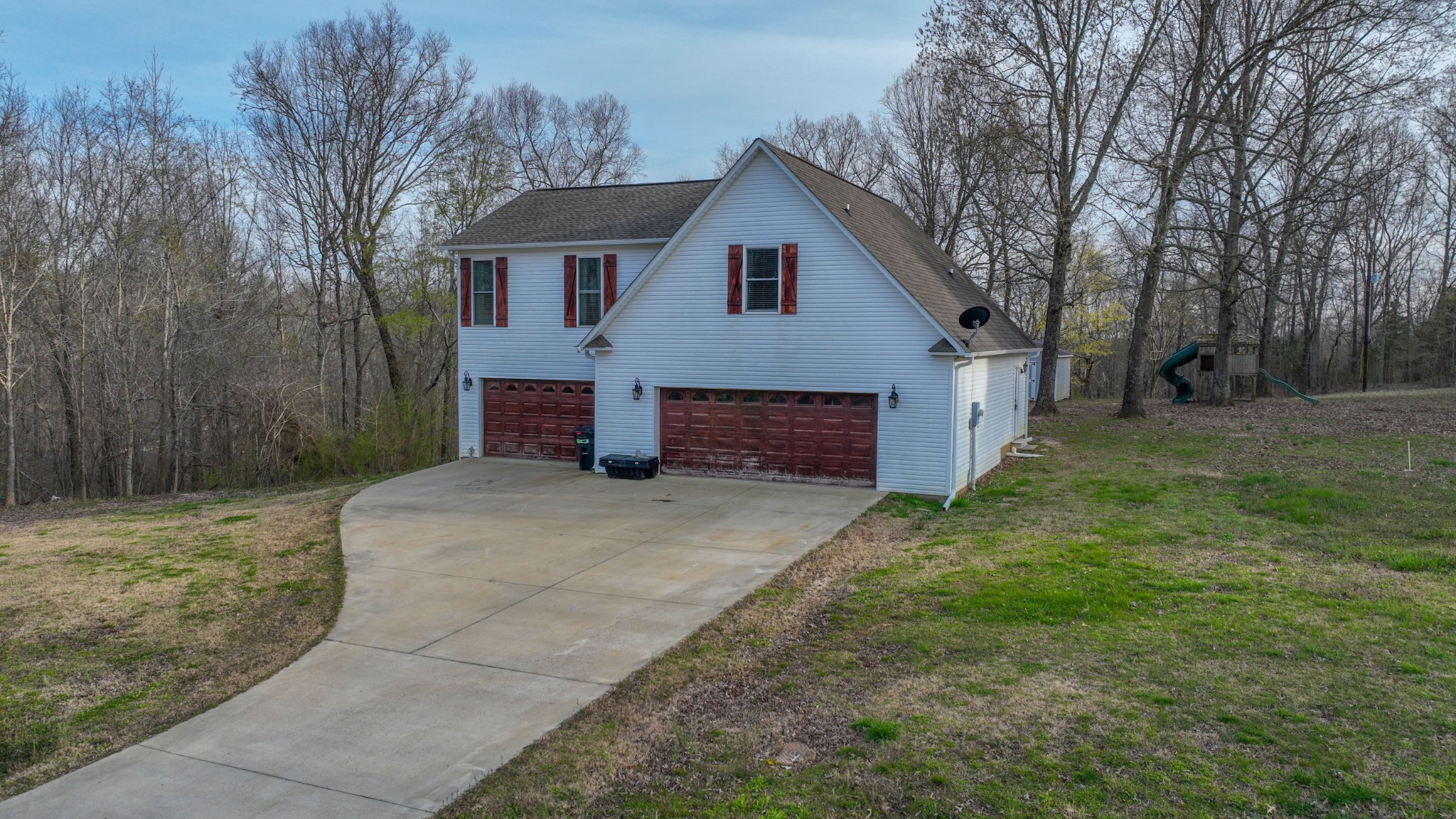 182 Lohrig Road Jackson, TN 38301 - Photo 3 of 25 a view of a house with a yard and large tree