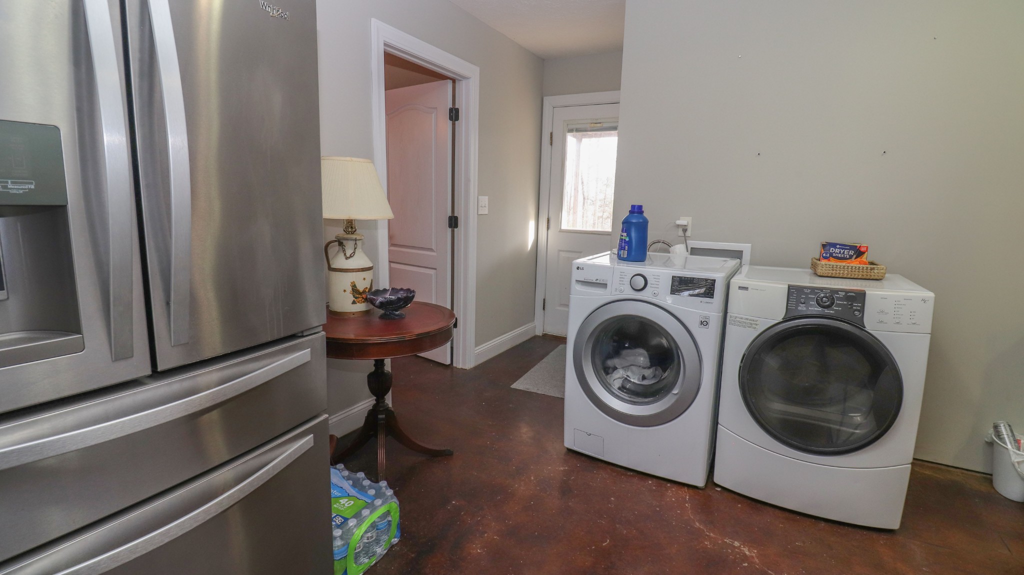 182 Lohrig Road Jackson, TN 38301 - Photo 9 of 25 a utility room with sink dryer and washer