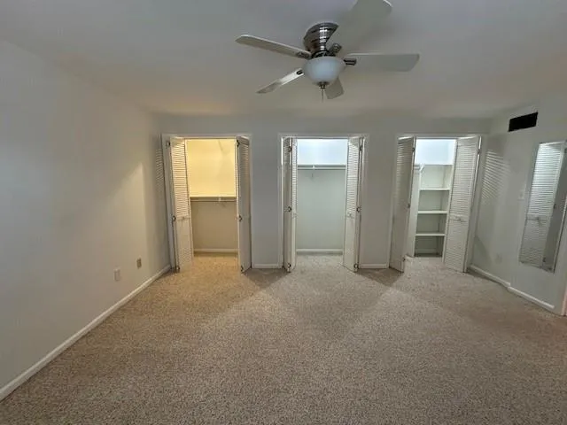 an empty room with a bathroom