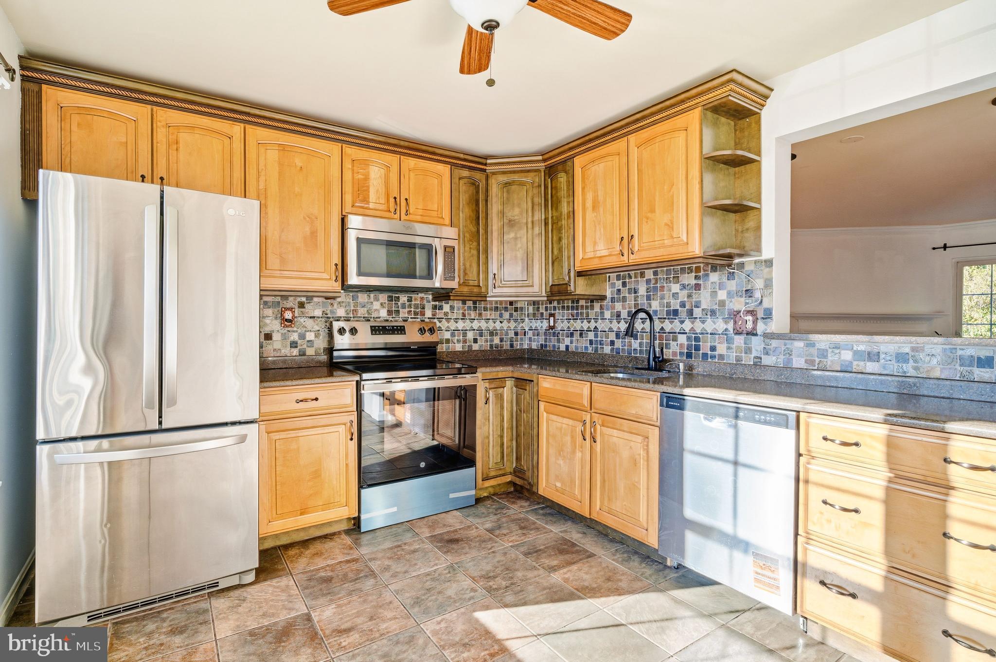 6 Offspring Court Perry Hall, MD 21128 - Photo 11 of 39 Stainless appliances, granite and full backsplash