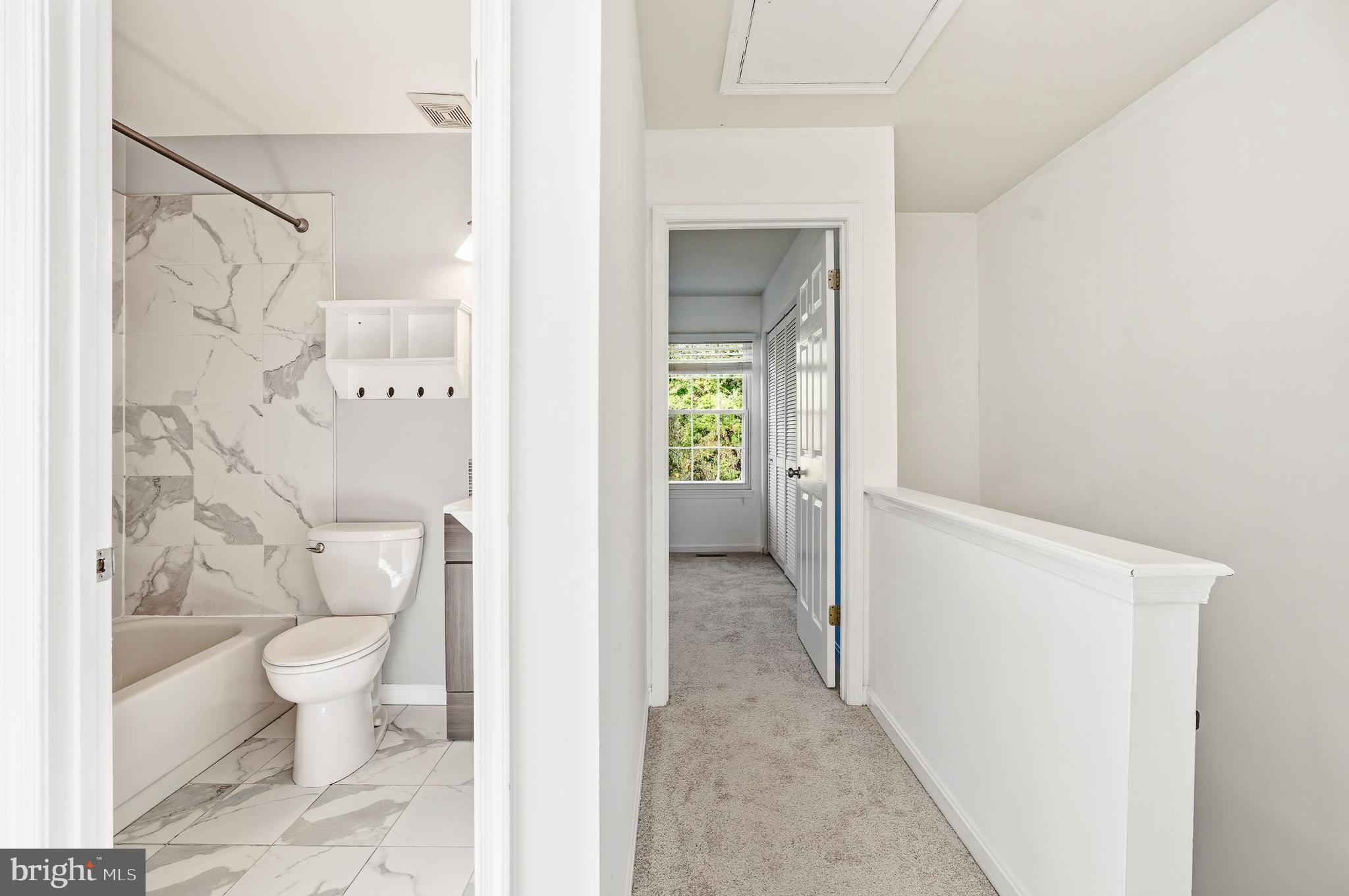 6 Offspring Court Perry Hall, MD 21128 - Photo 23 of 39 Hall bath has beautiful quartz tile