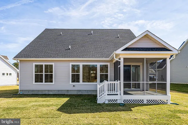 a view of a house with swimming pool and porch