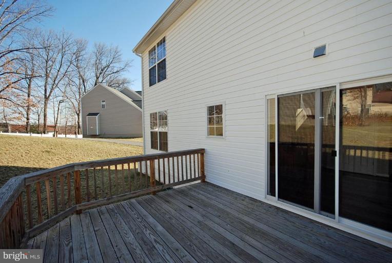 5970 Florey Road Hanover, MD 21076 - Photo 30 of 30 a view of a house with wooden floor