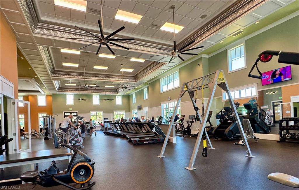 6466 Warwick Avenue Naples, FL 34113 - Photo 31 of 43 a view of a room with gym equipment