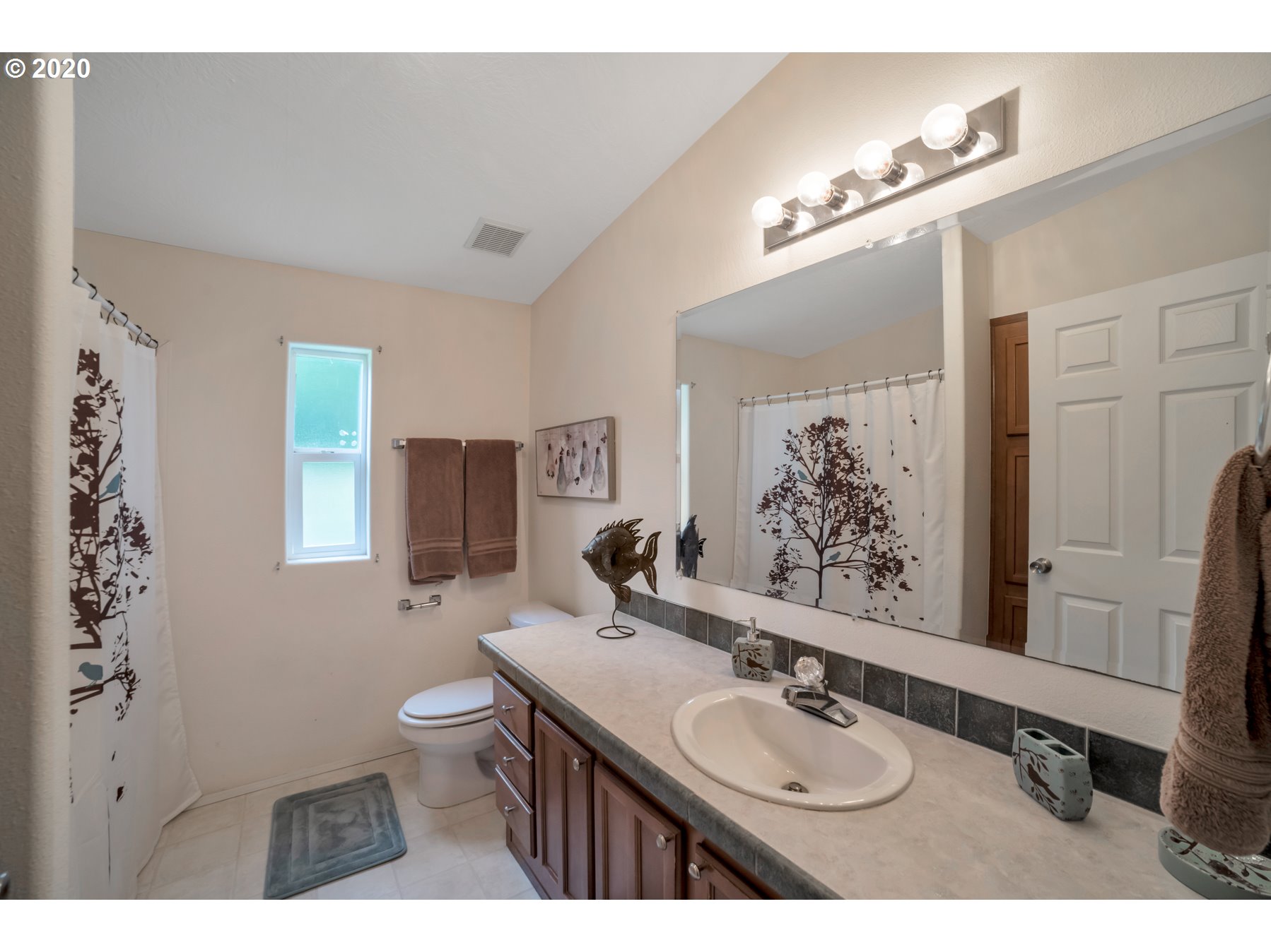 6990 Northwest Canyonview Road Gaston, OR 97119 - Photo 15 of 32 a bathroom with a sink double vanity granite and a mirror