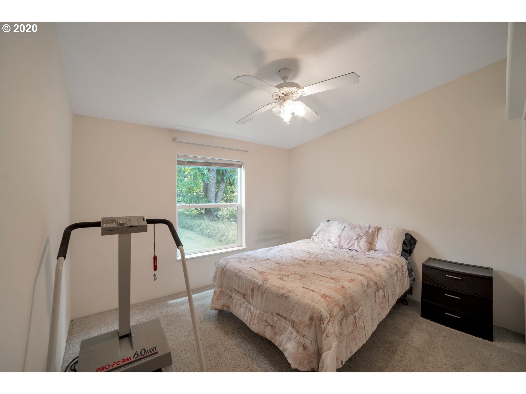 6990 Northwest Canyonview Road Gaston, OR 97119 - Photo 16 of 32 a bedroom with a bed window and a table