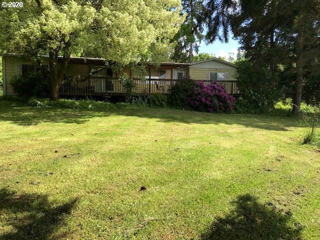 6990 Northwest Canyonview Road Gaston, OR 97119 - Photo 21 of 32 a front view of house with yard and trees