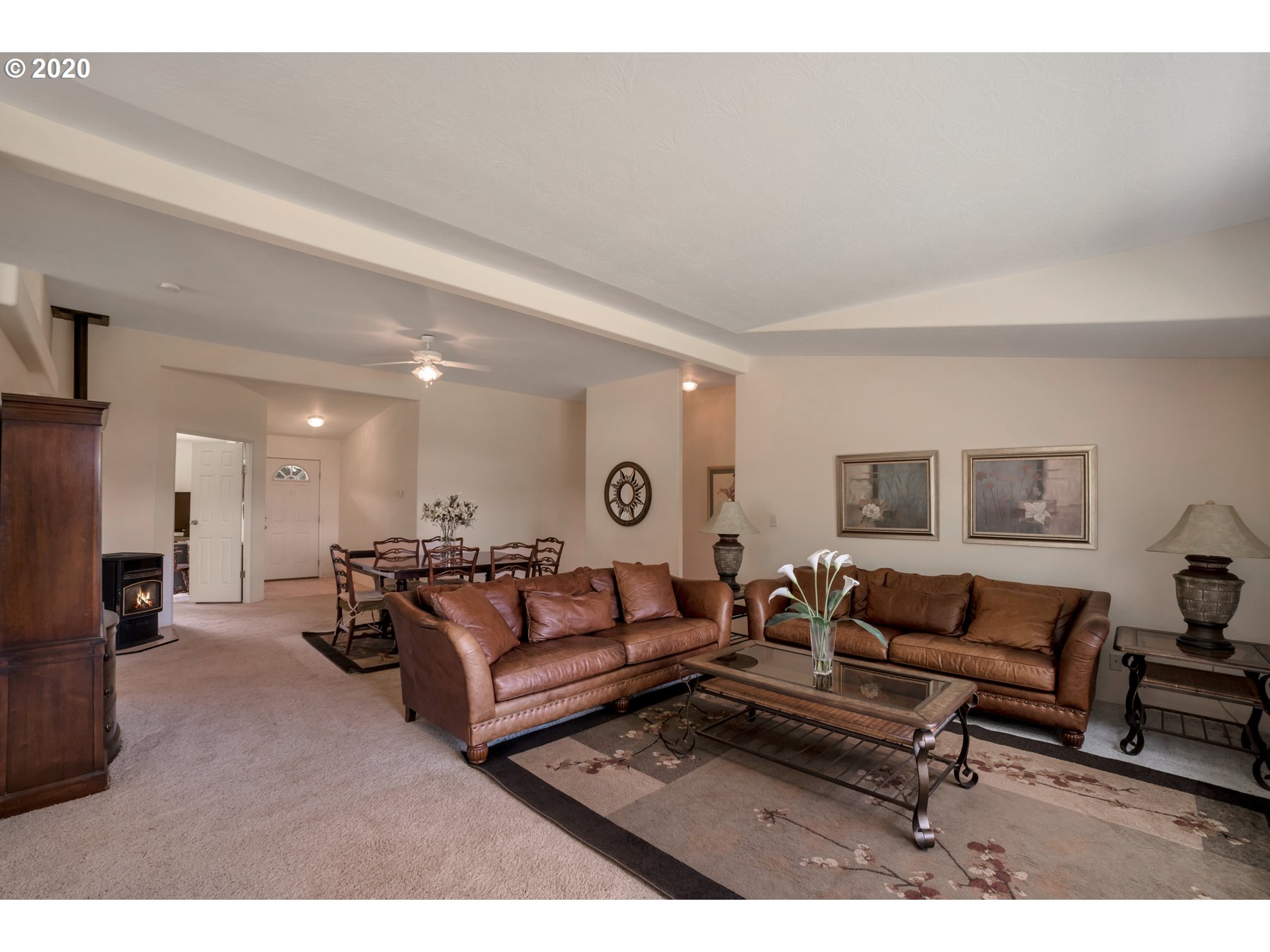6990 Northwest Canyonview Road Gaston, OR 97119 - Photo 7 of 32 a living room with furniture and a couch