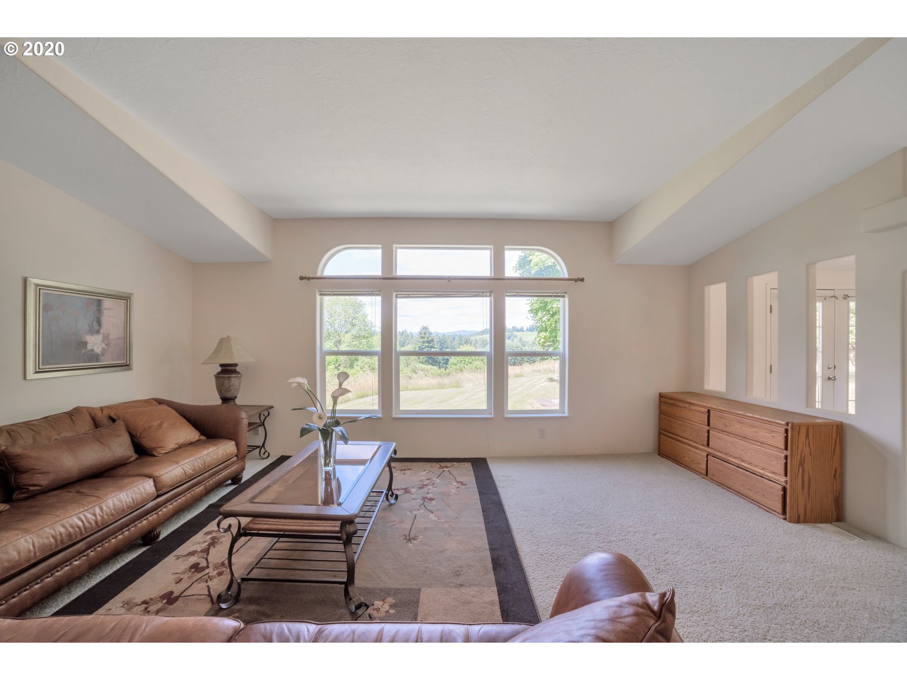 6990 Northwest Canyonview Road Gaston, OR 97119 - Photo 8 of 32 a living room with furniture and a window