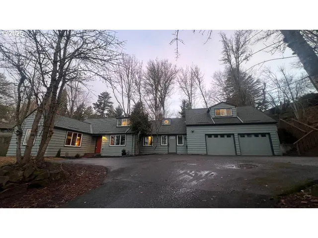 a black and white photo of a house