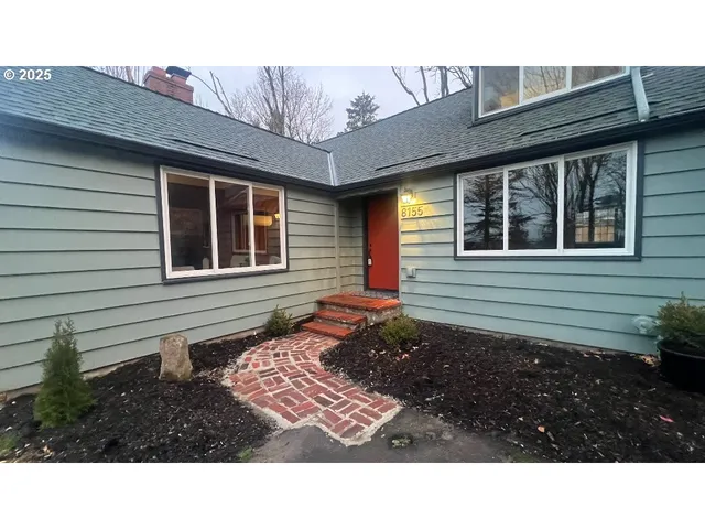 a black and white photo of a house