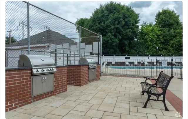 a view of a terrace with sitting area
