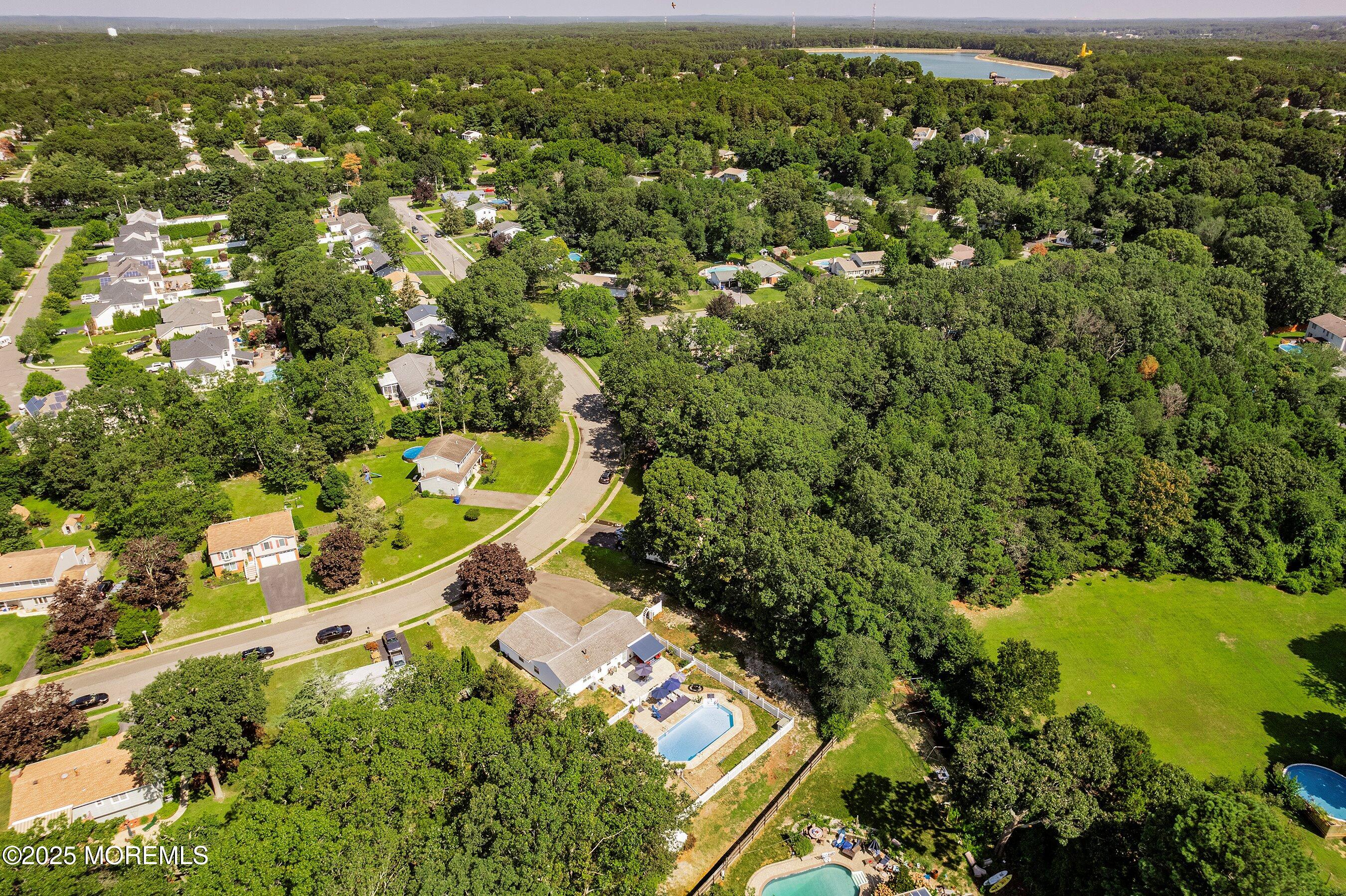 718 Millbrook Road Brick, NJ 08724 - Photo 22 of 26 an aerial view of residential houses with outdoor space