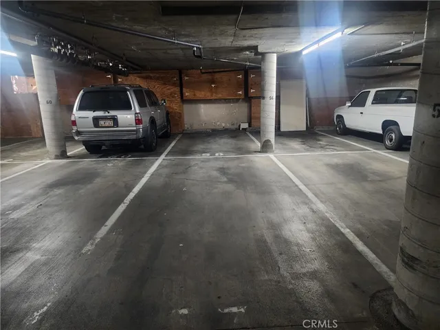 a view of an house with backyard space and balcony