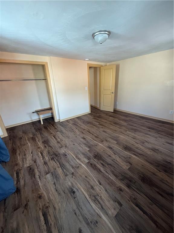 302 Neubert Street Kittanning, PA 16201 - Photo 12 of 23 a view of an empty room with wooden floor and a window