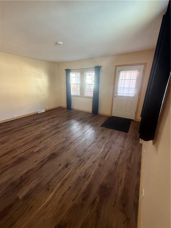 302 Neubert Street Kittanning, PA 16201 - Photo 15 of 23 wooden floor in an empty room with a window