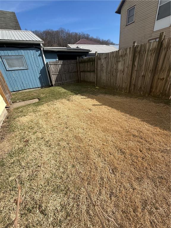 302 Neubert Street Kittanning, PA 16201 - Photo 20 of 23 a view of backyard with pathway and a barn
