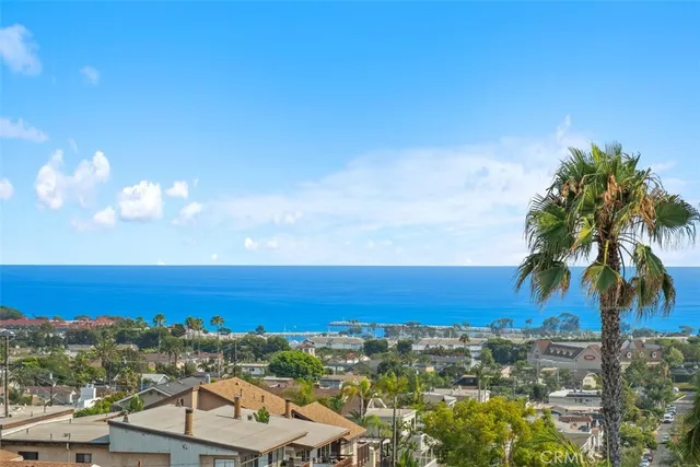 a view of a city with ocean view