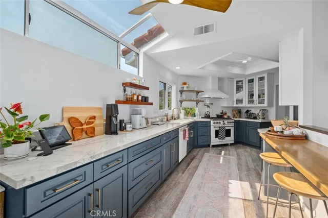 a kitchen with granite countertop lots of counter top space