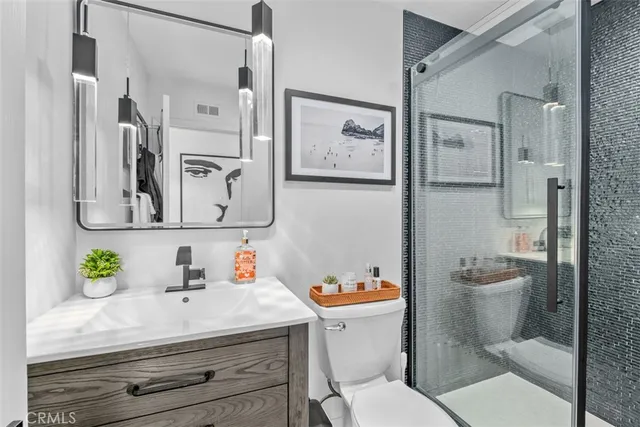 a bathroom with a bathtub and shower