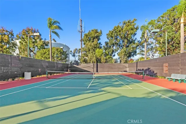 a front view of a house with a yard and a garage