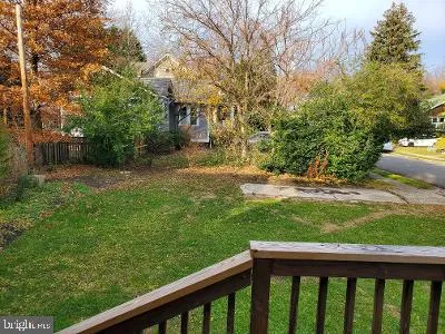 a view of a yard with a trees
