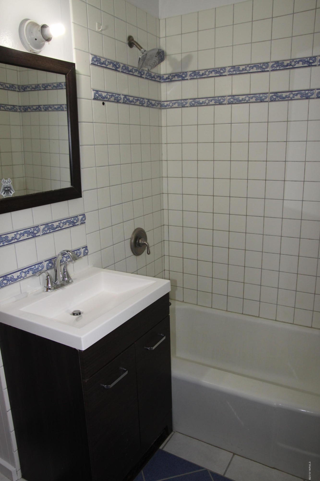 741 McPhee Road Naches, WA 98937 - Photo 7 of 16 a bathroom with a sink vanity granite tub shower and a mirror