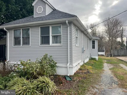 a view of a backyard of the house