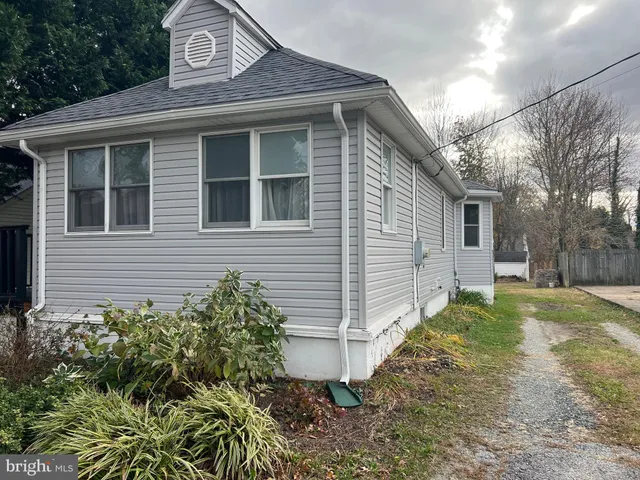 a view of a backyard of the house