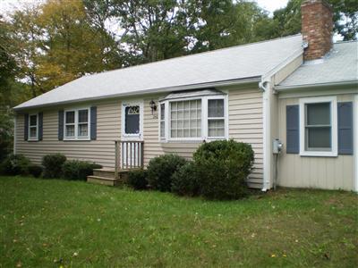 240 Cedric Road Centerville, MA 02632 - Photo 3 of 10 a view of a house with a garden